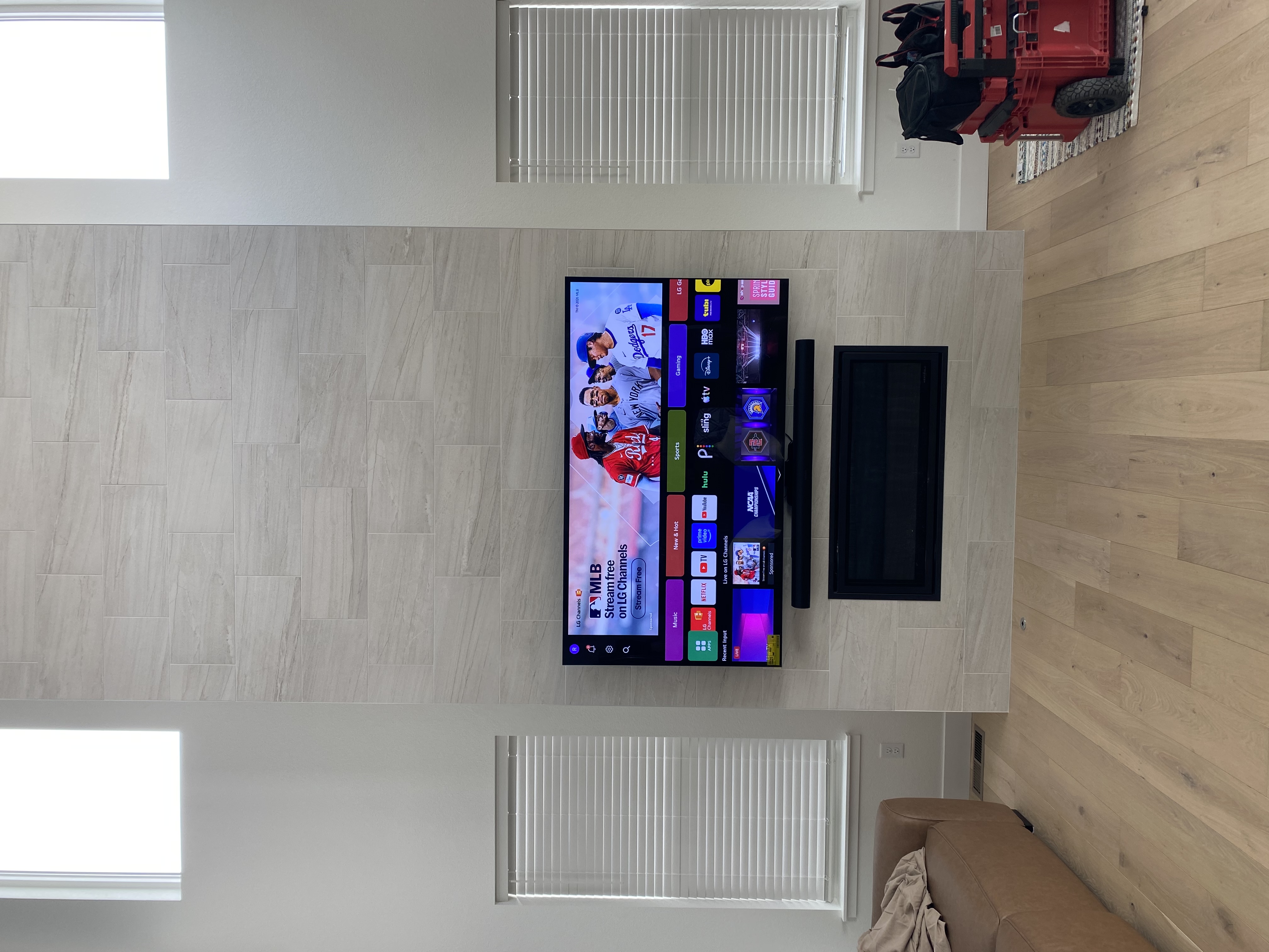 Professional TV mounting on tile fireplace wall – Mighty Mounts Colorado
